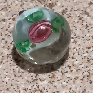 Old sml button very pretty I used as pendant for cat n myself over years unique